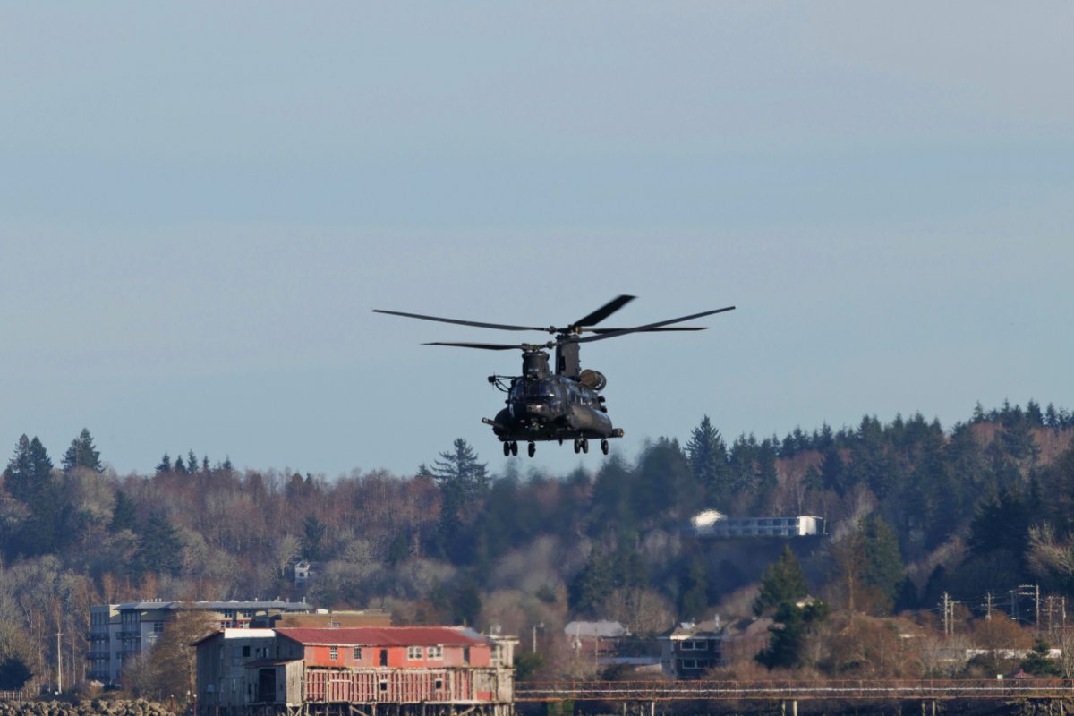 Heavy-lift military helicopter in flight